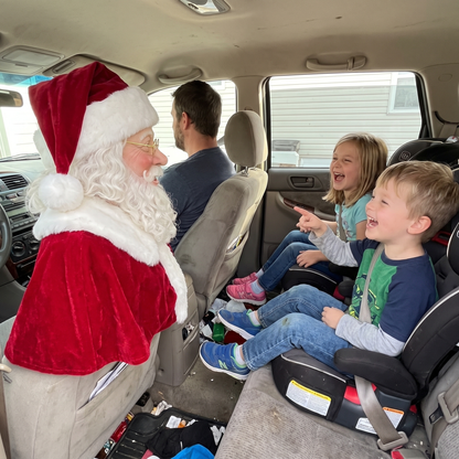 Kids laughing at SleighRider in the car