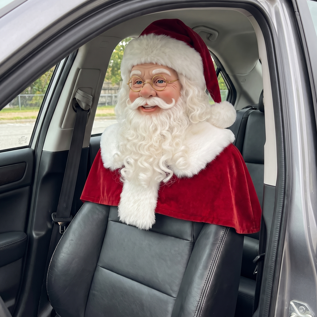SleighRider Santa mounted on a black leather car seat